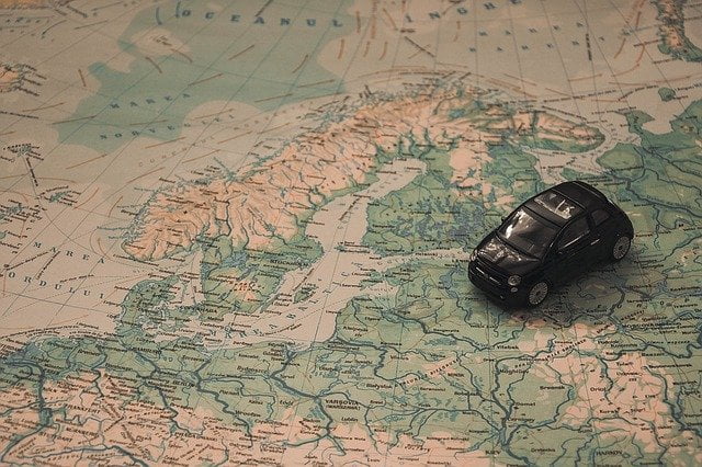 Europe map with toy car on it