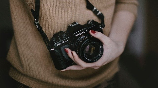 Vintage camera in the hand