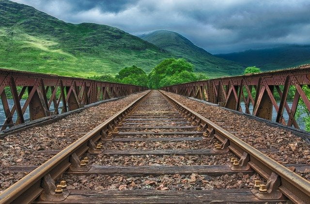 Railway bridge with scenic mountain views