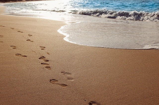 Footsteps in the sand on a beach in Maui, Hawaii 