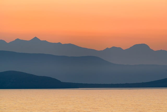 Greece sunset water mountain views
