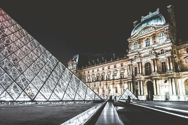 The Louvre in Paris, France at night