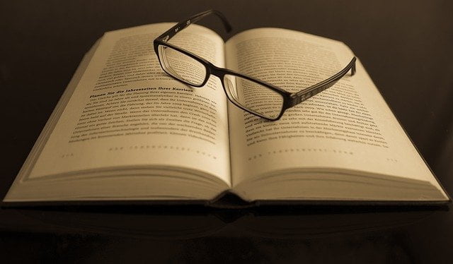 Glasses on top of book