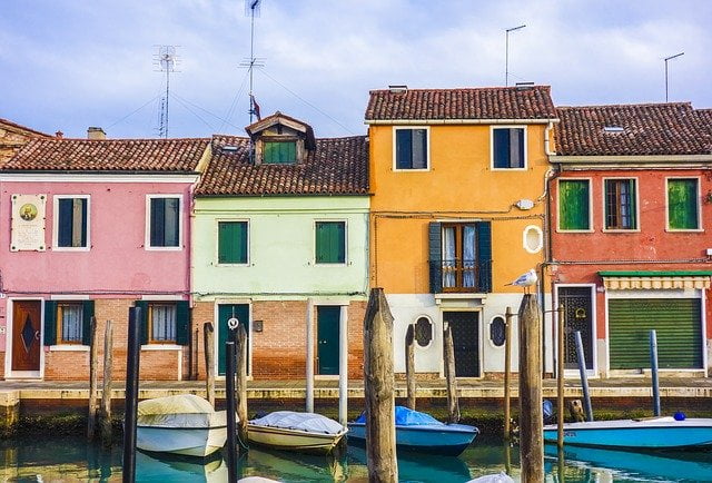 Venice colorful boats and houses in Italy